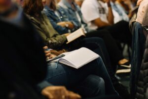 Crowd taking notes